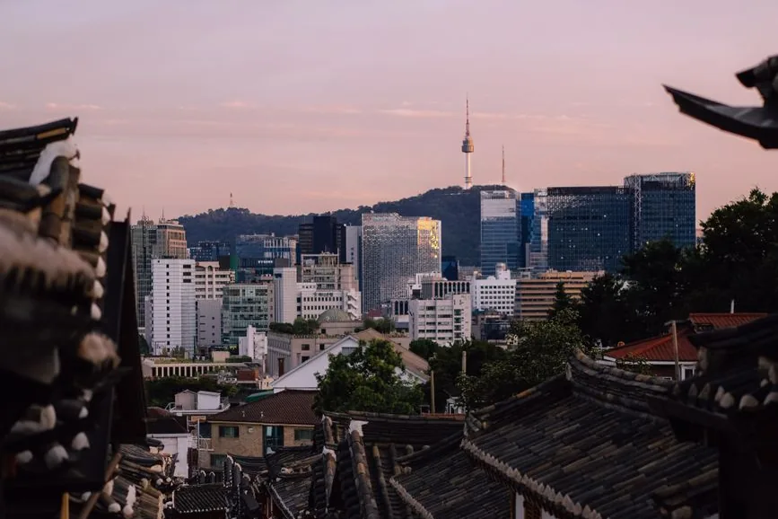 Seoul at dusk, N Seoul Tower rising above the Bukchon rooftops