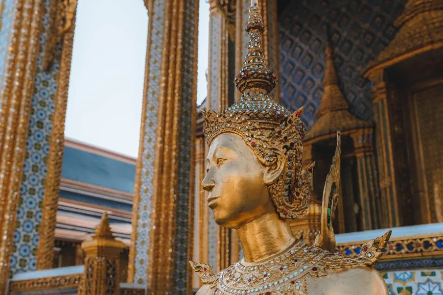 A gilded guardian figure at the Grand Palace, Bangkok