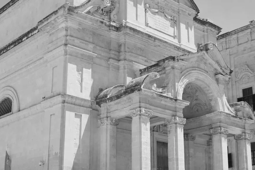 A baroque church facade in southern Europe